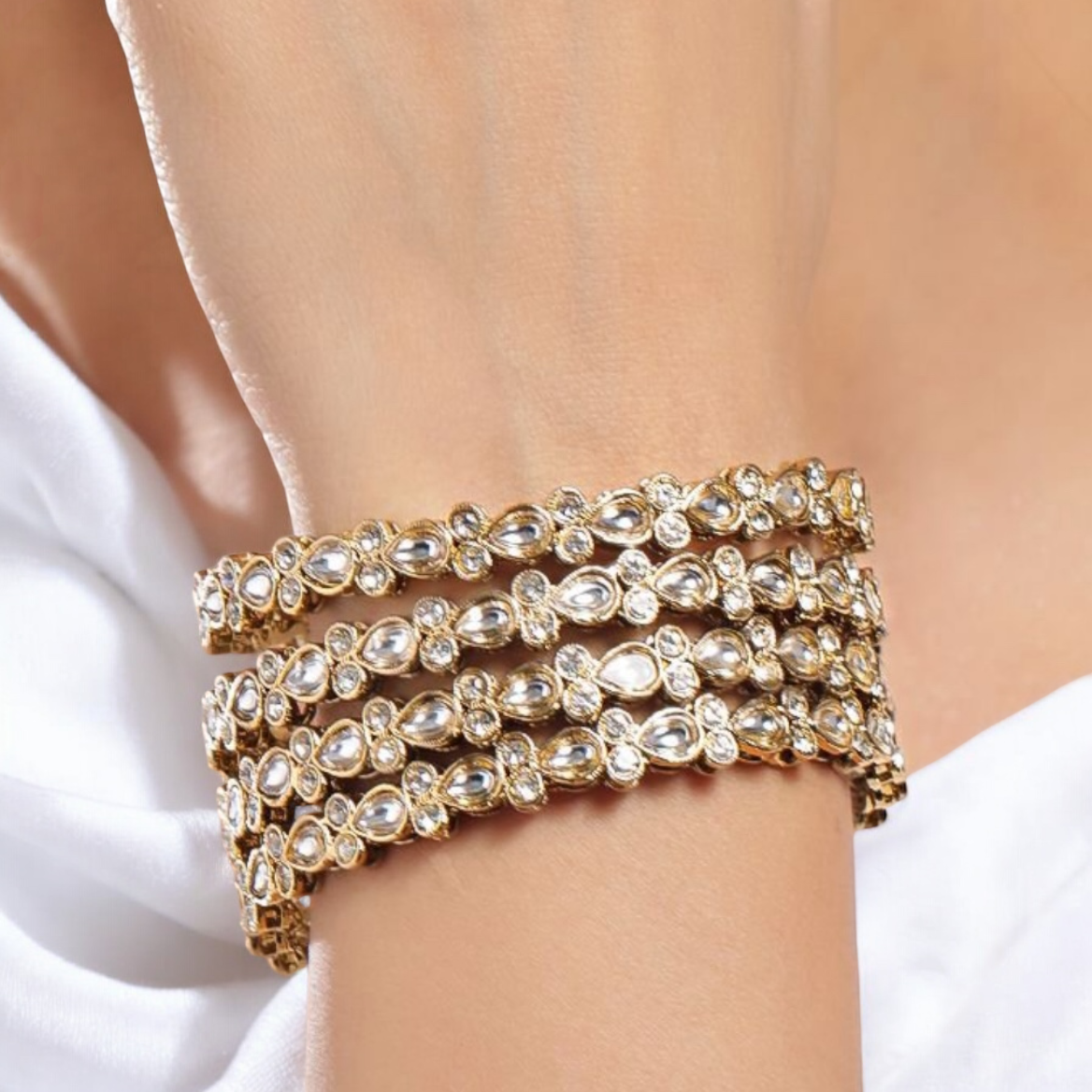 Lavish Giftz Gold Plated Kundan and Cubic Zirconia Studded Bangles - Set Of 4
